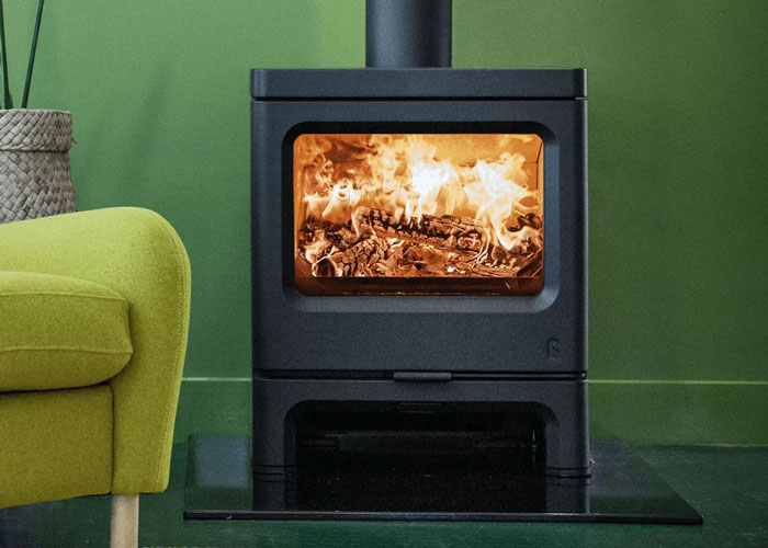 Charnwood Skye 7 Wood Burning Stove with a fire inside.