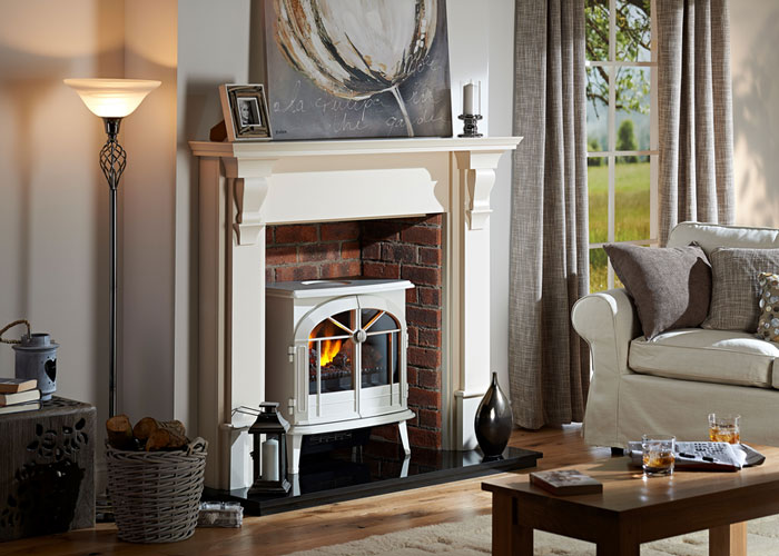 Dimplex Meribel free standing stove inside a fireplace.